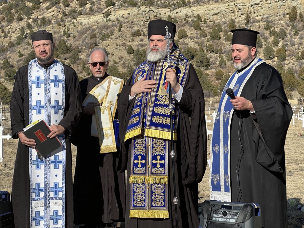 Bishop Constantine of the Greek Orthodox Metropolis of Denver, second from right, presided over the Feb. 5 observance of the 100-year anniversary of the 1923 mine disaster at Dawson Cemetery. He was accompanied by, from left, the Rev. Dimitrios Pappas of St. Elias the Prophet in Santa Fe, the Rev. Deacon Constantine Bardossas of St. Catherine in Greenwood Village, Colorado, and the Rev. Conan Gill of St. George in Albuquerque.