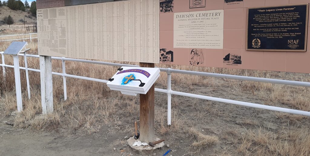 A new memorial box was installed last month near the entrance to historic Dawson Cemetery. The box contains a log for visitors to record impressions of their visit. (Photo courtesy of Tim Gianulis)